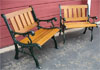 Outdoor benches Essex Green metal sides, golden oak slats.