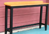 Custom made sofa table. Honey maple top, black base.