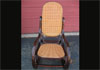 Bentwood rocker with press cane seat and back.
