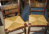 Pair of Hitchcock chairs with pre-twisted natural rush seats.